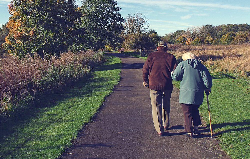 older retired couple walking